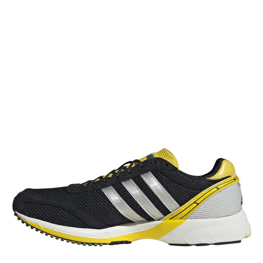 Black mesh low-top sneakers with silver 3-Stripes and yellow accents, white midsole