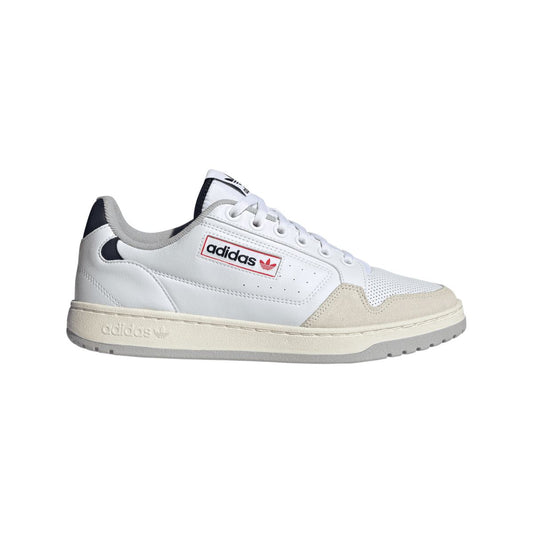White adidas NY 90 low-top trainers with suede overlays and lace-up closure.