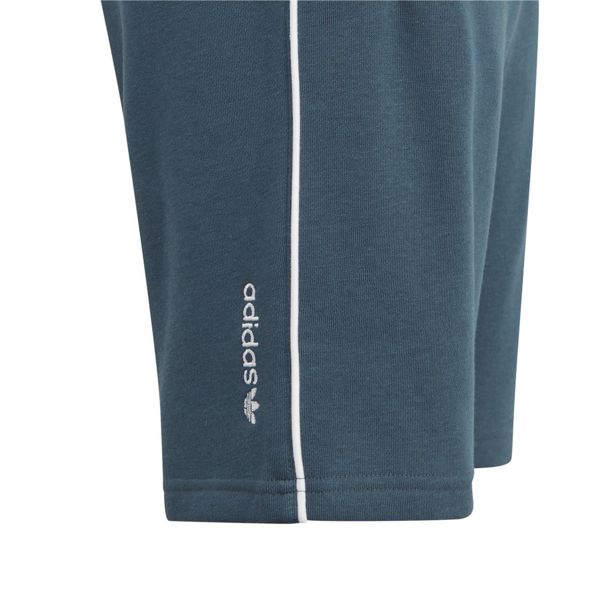 Blue shorts detail with vertical adidas logo and side seam panel