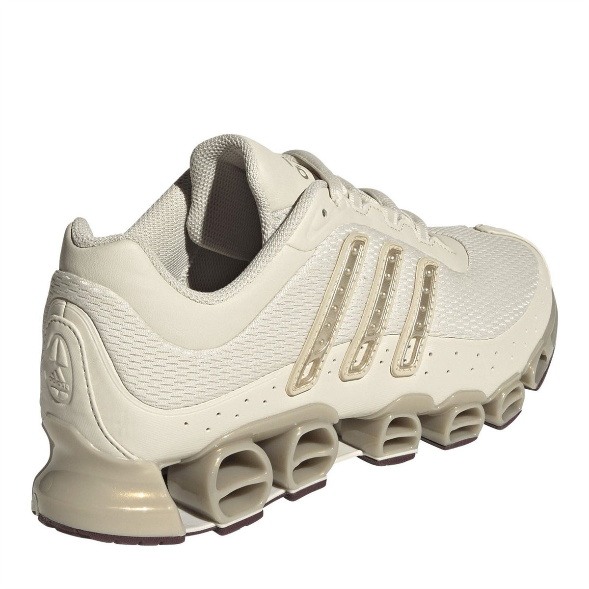 Women's light cream adidas Originals Megaride sneaker with cushioned collar and padded tongue