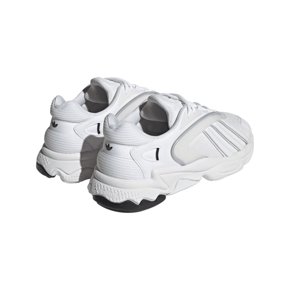 White adidas Originals Oztral trainers, rear three-quarter view with cushioned collar