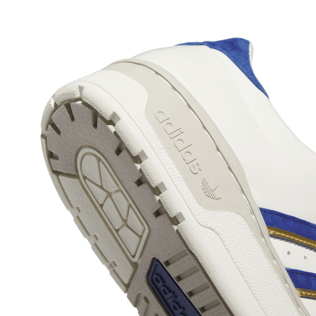 adidas Rivalry 86 low-top trainers close-up of sole, blue logo on white midsole