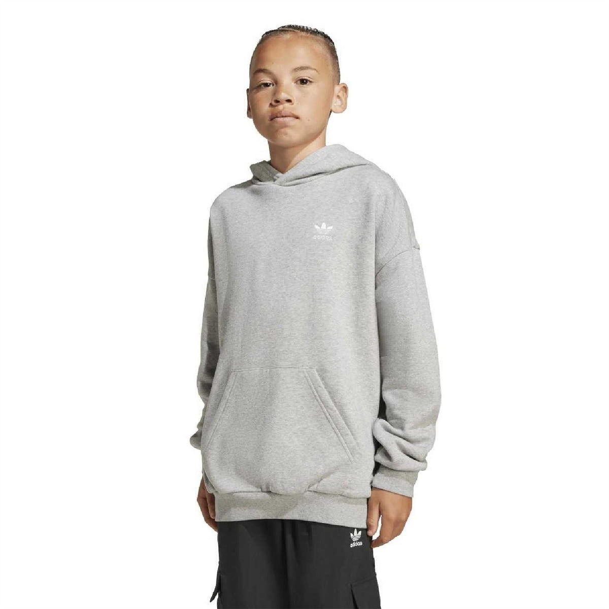 Grey adidas loose-fit hoodie with kangaroo pocket, worn by a junior