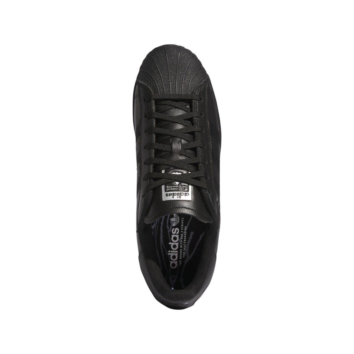 Black low-top trainers with lace-up front and cushioned tongue label