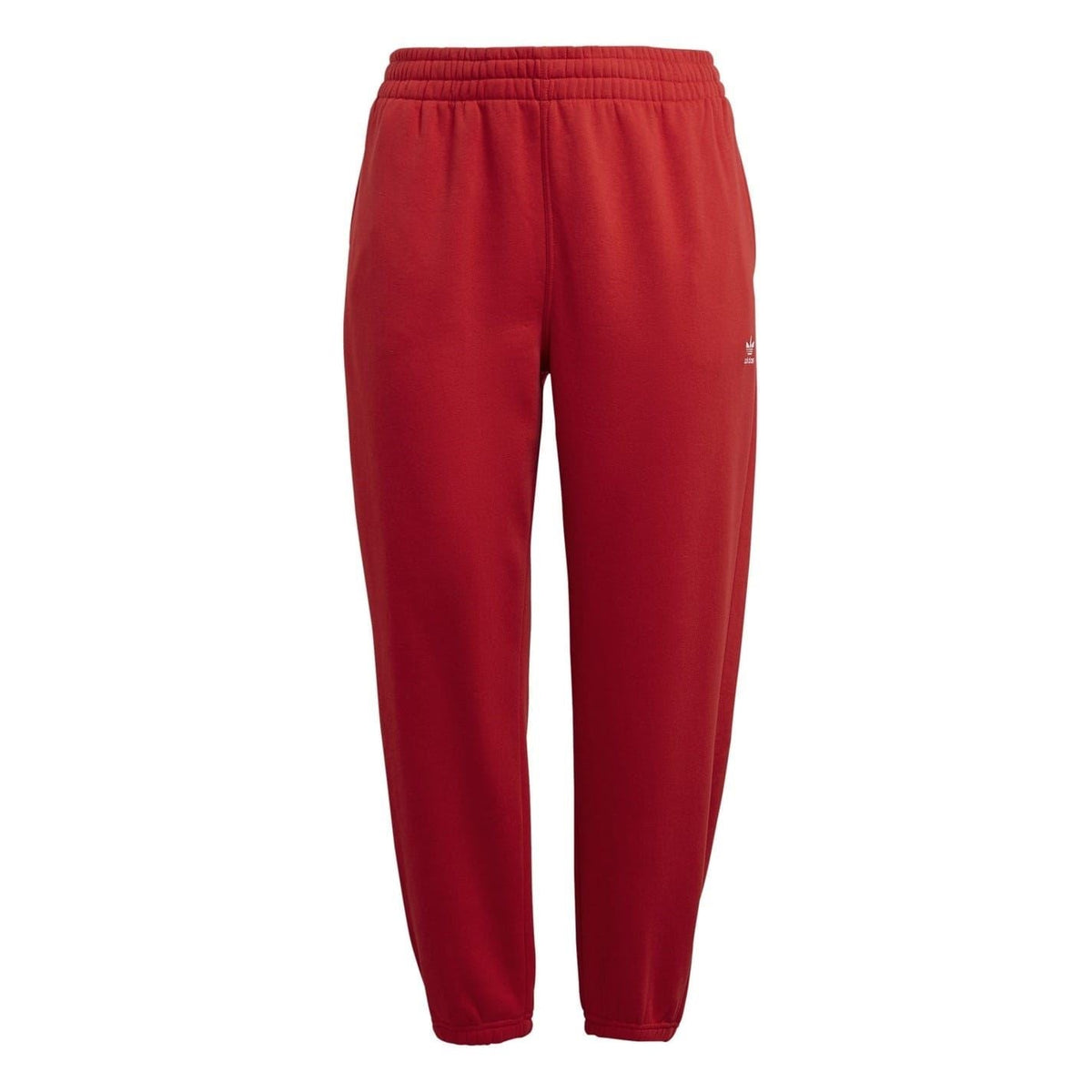 Red tapered joggers with elastic waistband and adidas trefoil logo