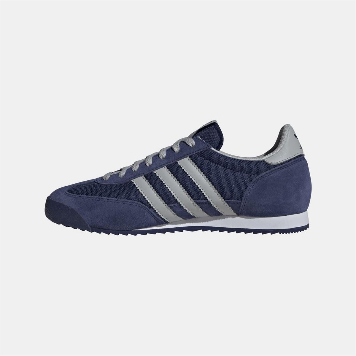 adidas Originals footwear showing stylish sneakers with classic design and branding, close-up of the shoe's side view