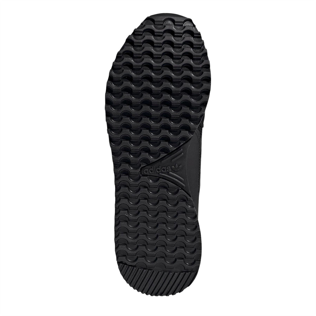Core Black adidas ZX 700 rubber outsole with deep, textured tread pattern