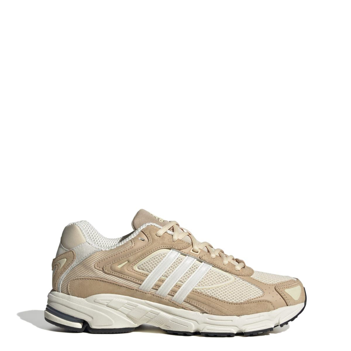 Low-top lace-up trainers in sand and off-white with cushioned midsole and striped side panels