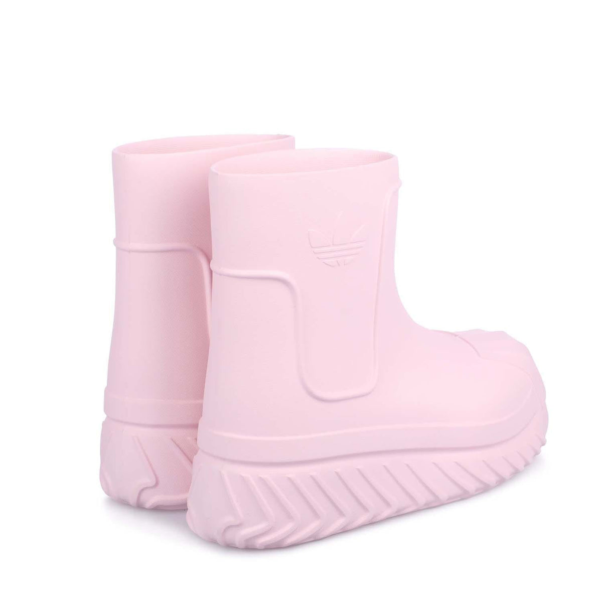 Pink mid-top boots, back view, molded logo patch and chunky ridged sole