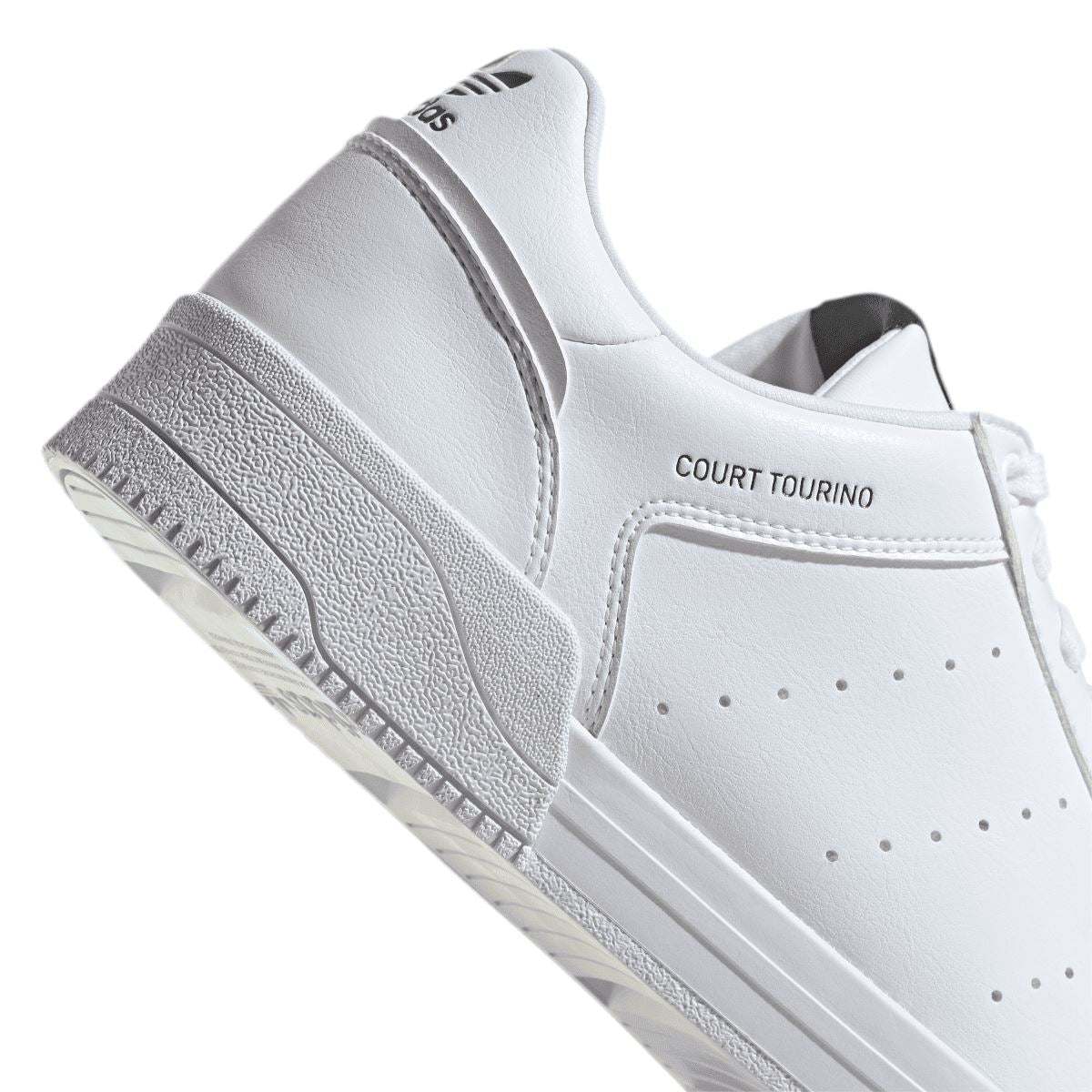 White adidas Court Tourino trainer heel and side, COURT TOURINO text on upper, textured sole.