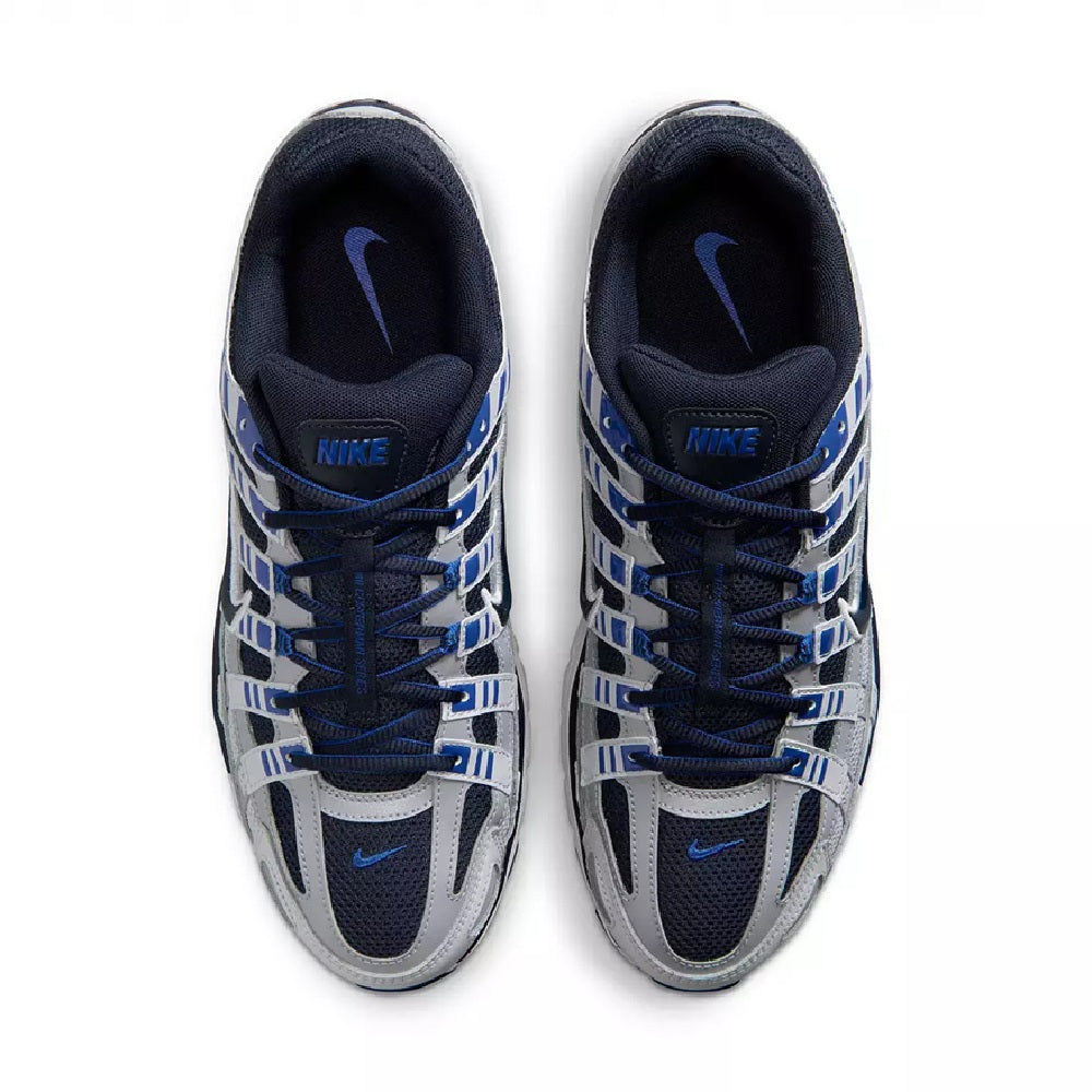 Nike P-6000 running shoes, top view with navy laces and blue graphic stripe pattern