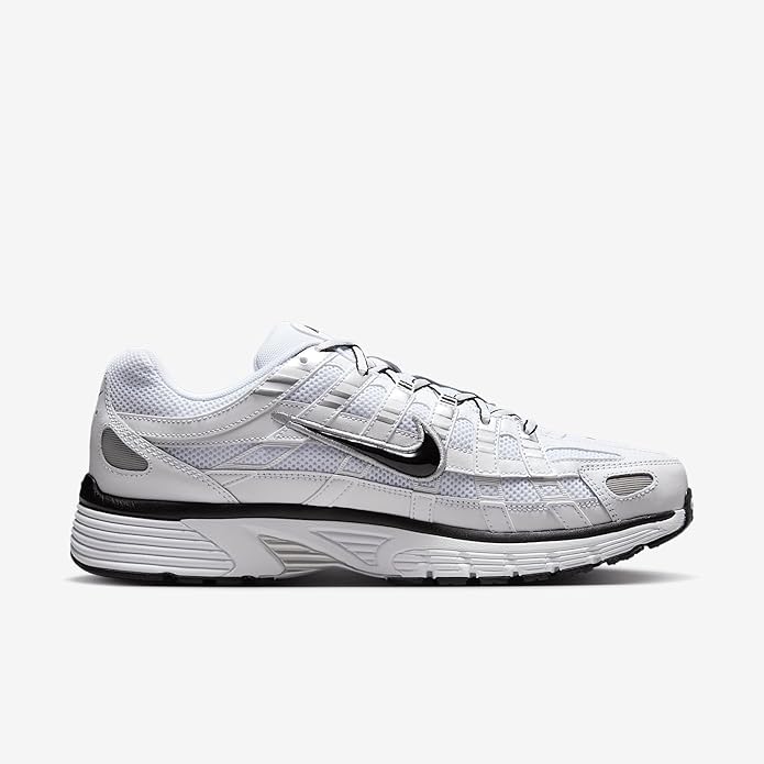 White Nike P-6000 lace-up sneaker with black Swoosh and gray-silver overlays, side view