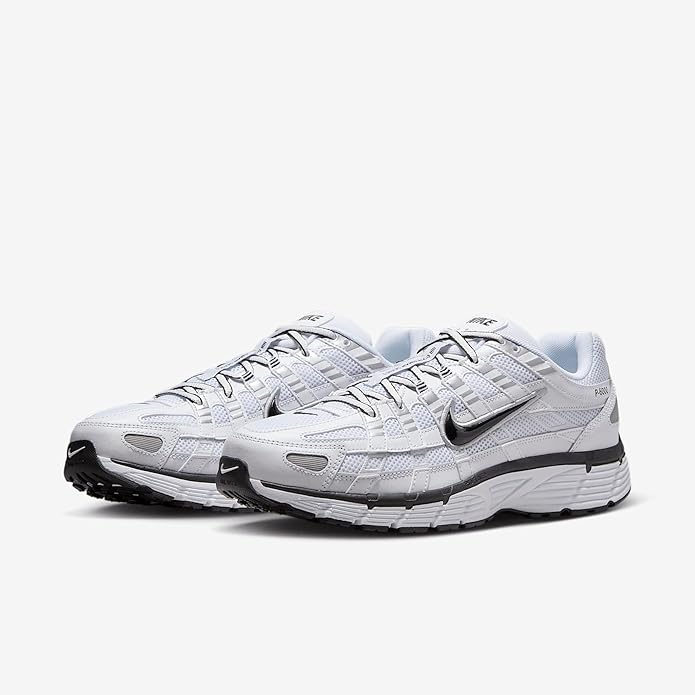 Nike P-6000 lace-up sneakers, white with black Swoosh and metallic silver detailing, angled pair
