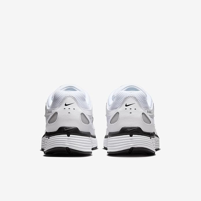 Nike P-6000 heel view: white mesh sneakers with black heel accents and striped midsoles