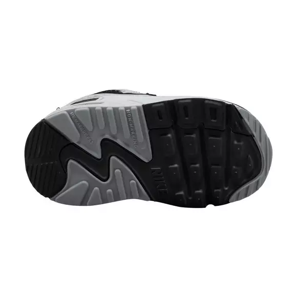 Toddler sneaker outsole, black tread with gray traction sections