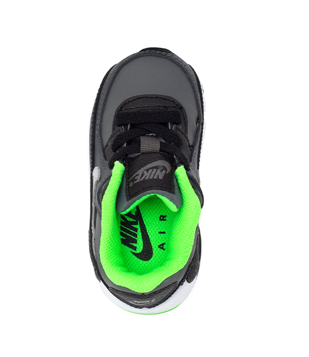 Toddler sneaker with neon green insole and Nike logo, black laces and dark gray upper