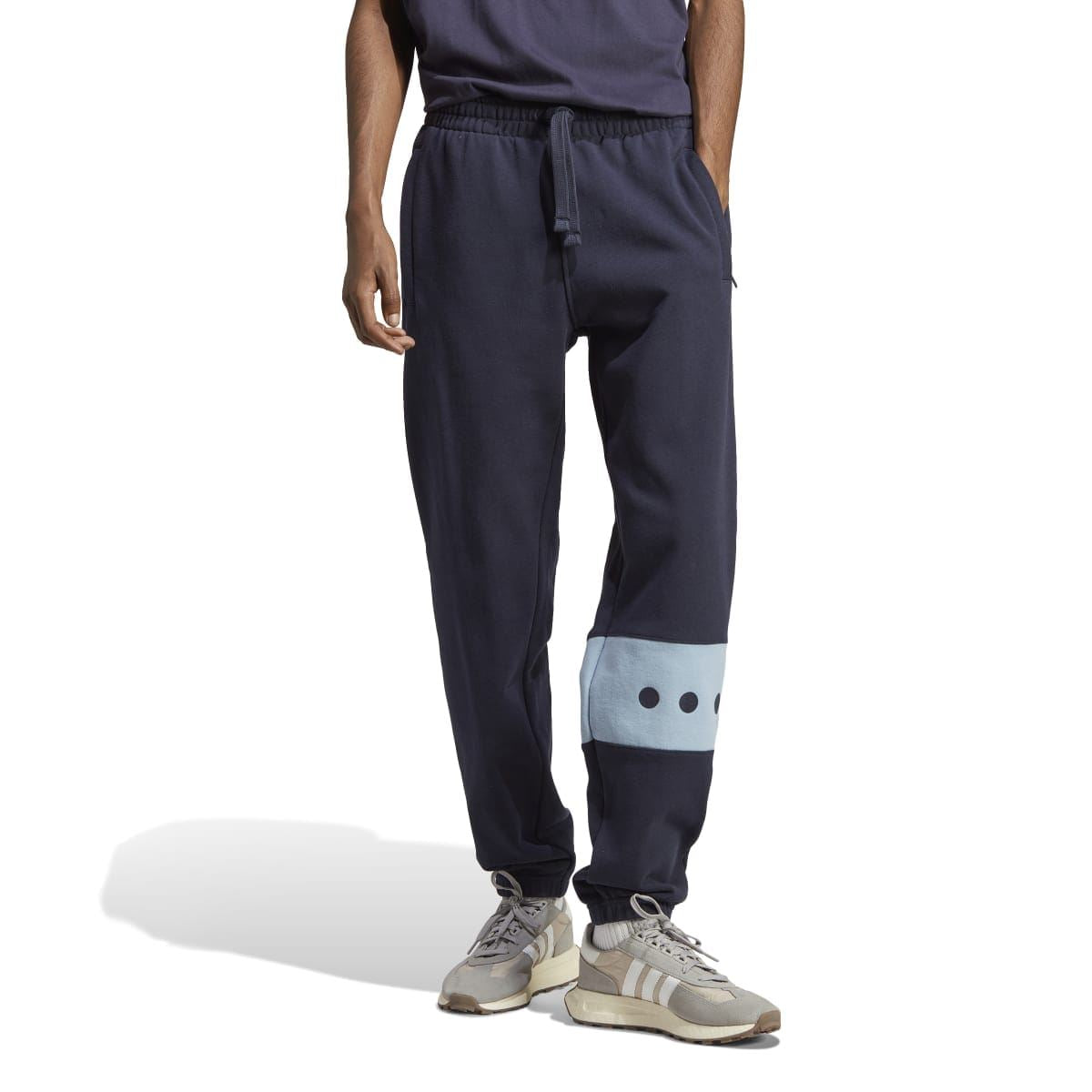 Navy mens joggers with elastic waist and light-blue knee panel; tapered leg