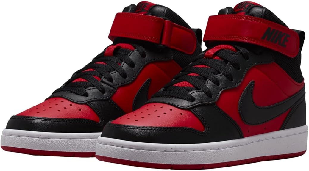 Kids' Nike mid-top sneakers, front pair view, red toe panels with black swoosh