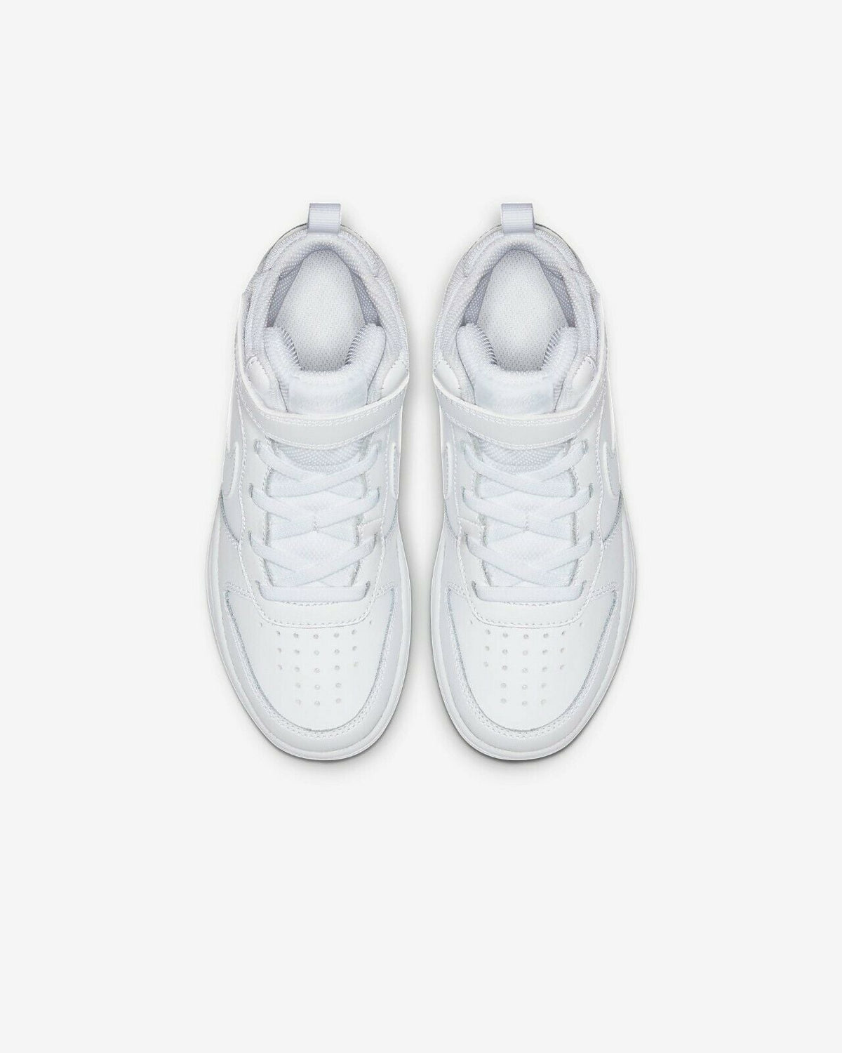 Pair of white kids' mid-top sneakers with laces and cushioned interior