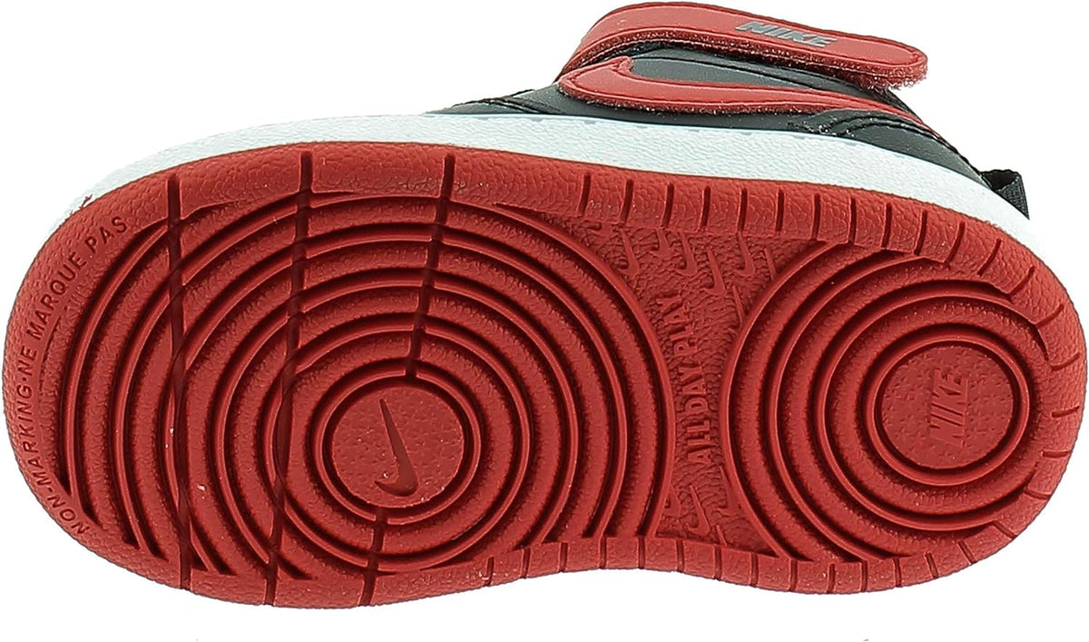 Toddler mid-top sneaker outsole tread in red with traction grooves