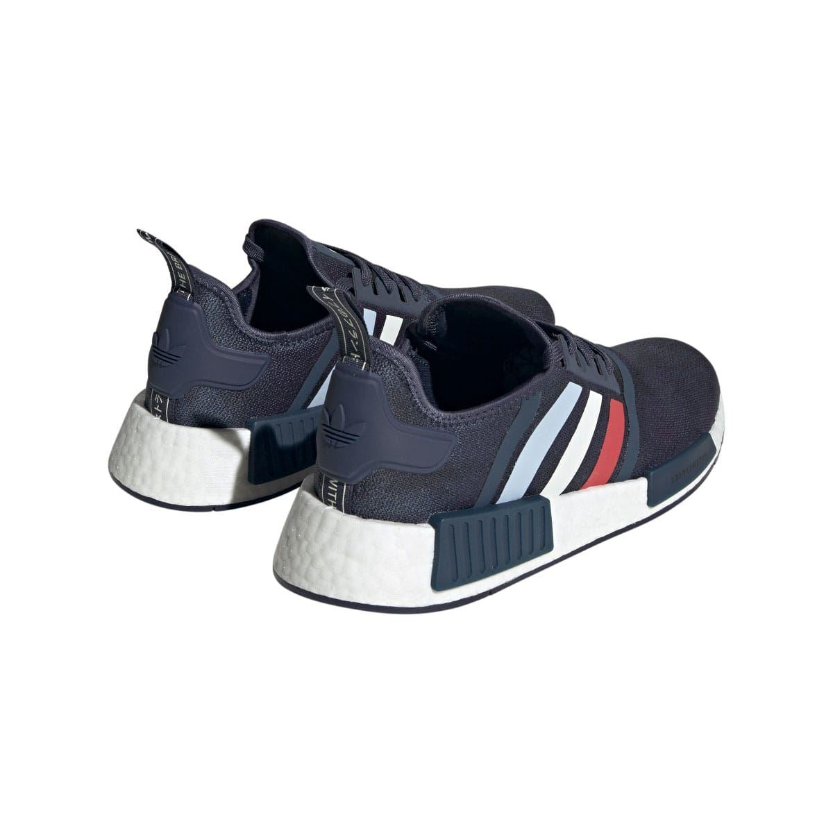 Navy adidas NMD R1 trainers with white heel panel and rear pull tab