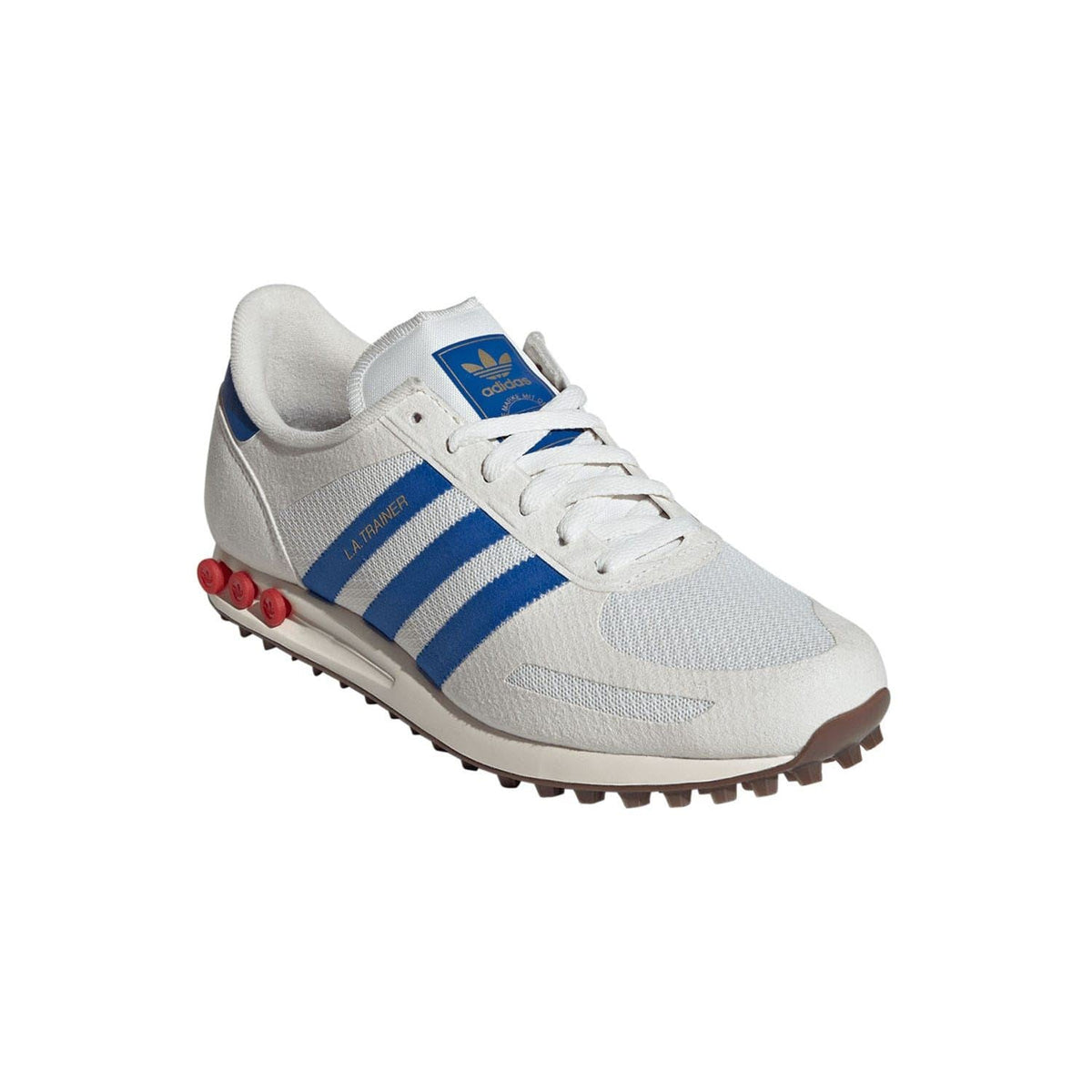 White adidas LA Trainer low-top sneakers with blue stripes, mesh panels, and red heel studs