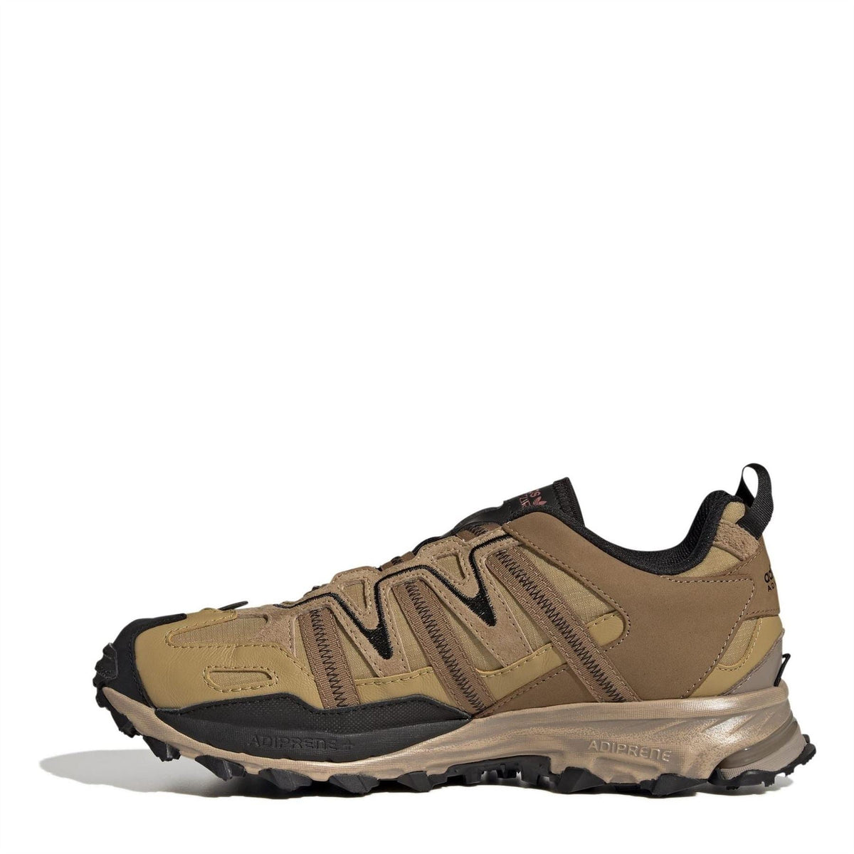 Tan beige low-top hiking sneaker with lace-up closure and chunky tread outsole