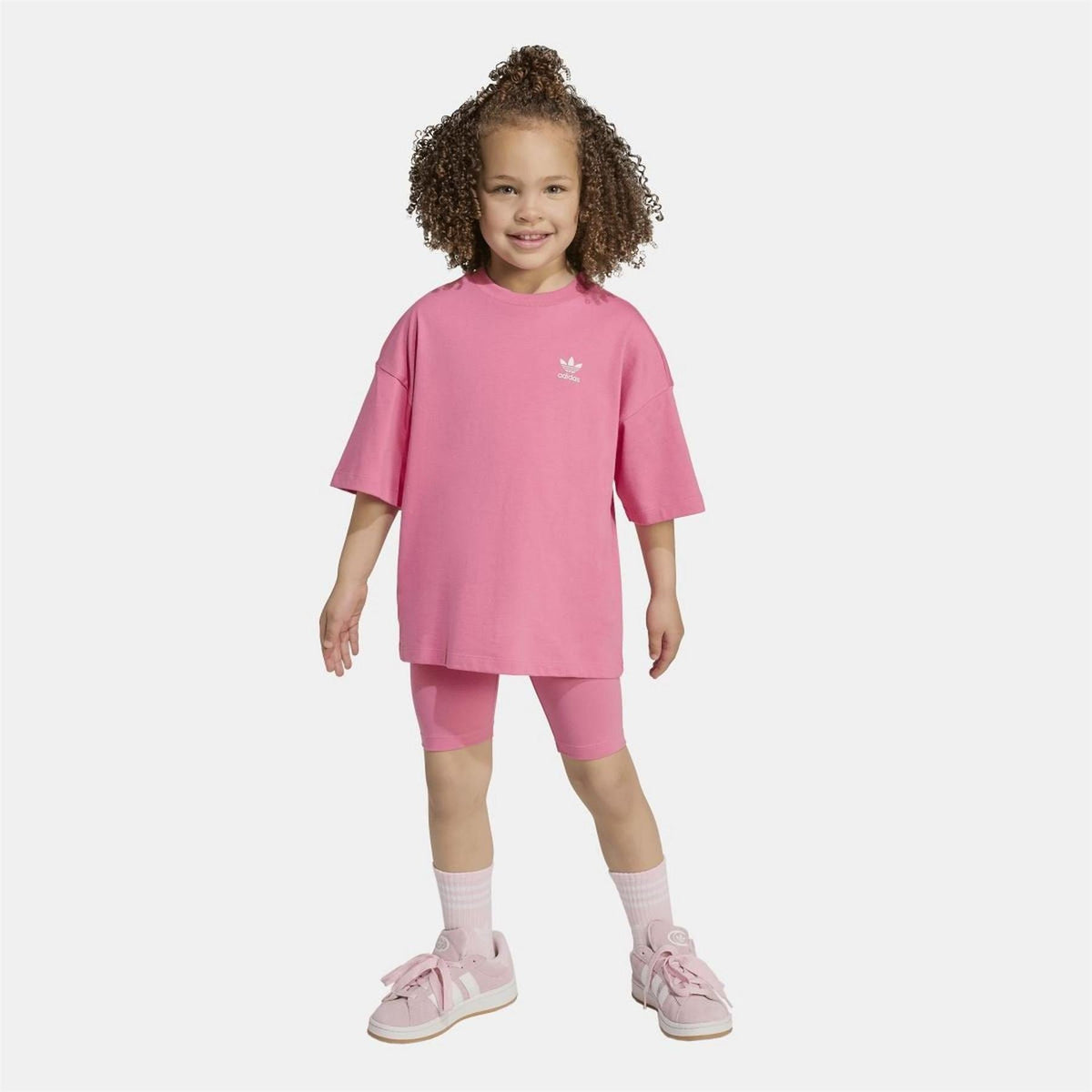 Pink adidas Originals T-shirt and shorts on child, trefoil logos on top and thigh