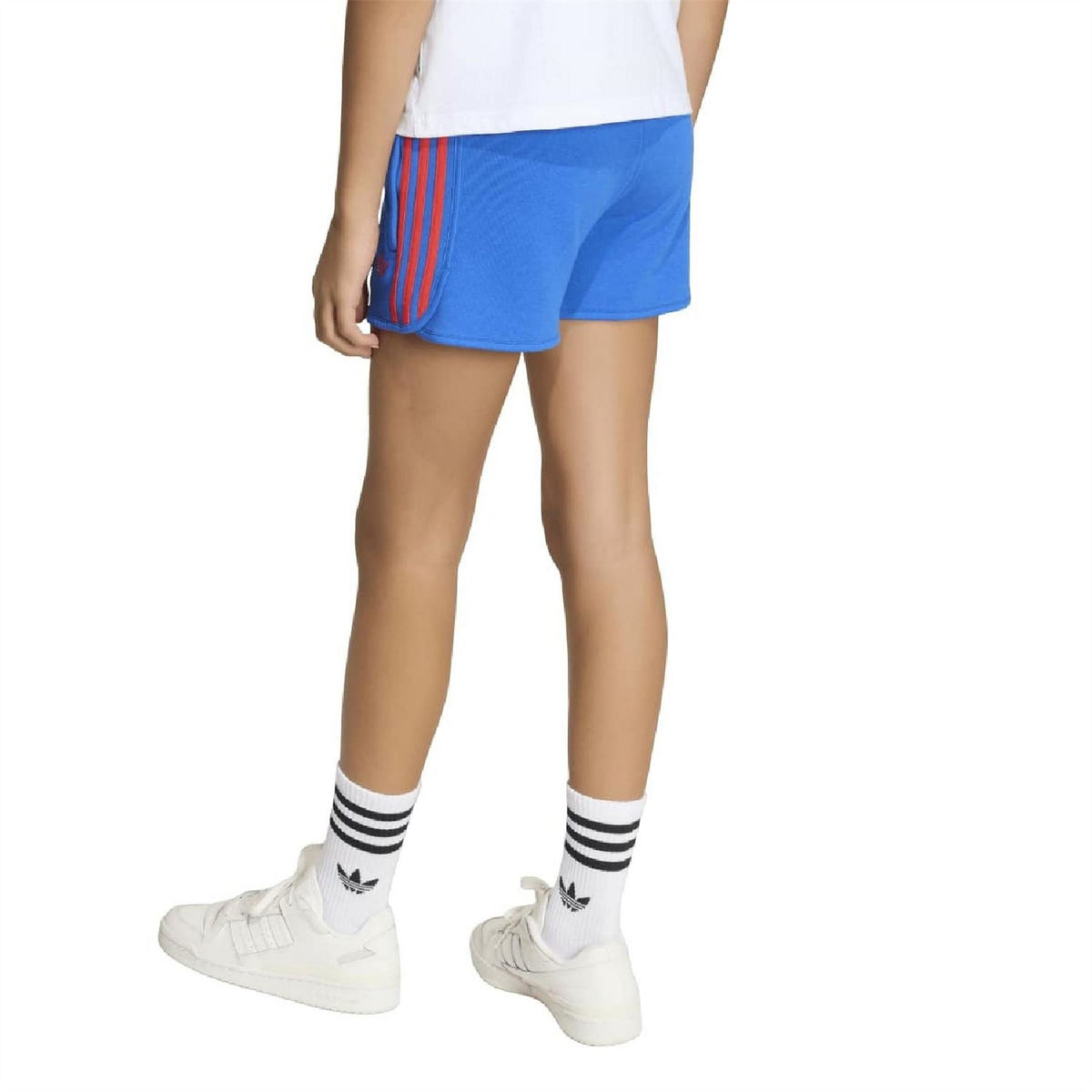 Blue juniors athletic shorts with red side stripes and sporty fit, side/back view