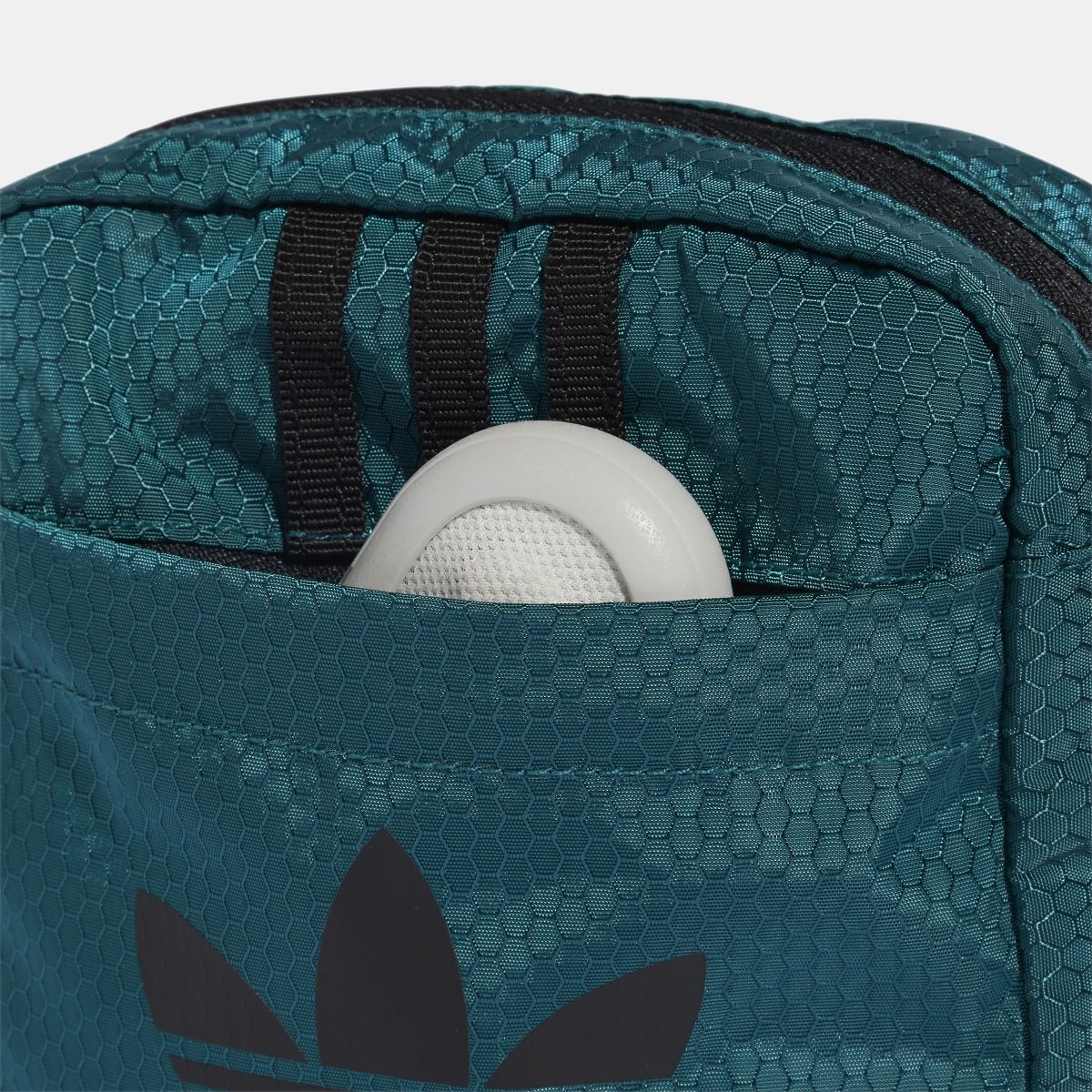 Teal adidas Originals small item bag with top opening and visible white insert