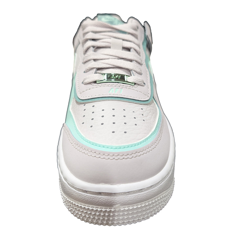 Nike AF1 Shadow front view in vast grey with mint trim and lace-up eyelets