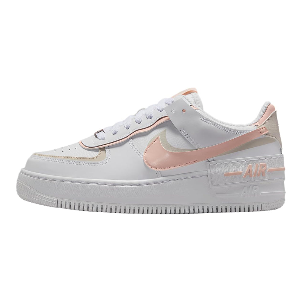 Women's low-top sneakers in white with coral-pink swoosh and Air branding