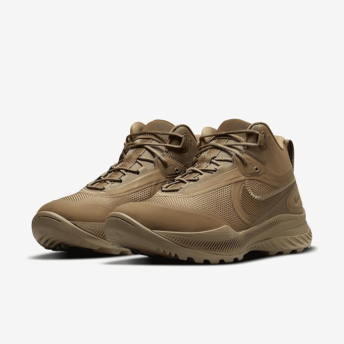 Men's Nike lace-up trail shoes, tan color, chunky sole with textured side tread