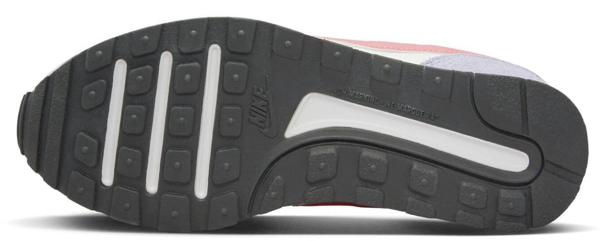Kids' Nike MD Valiant outsole tread, dark rubber with white stripe detail