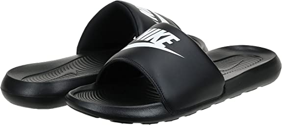 Black Nike Victori One slide sandals with white swoosh on the straps