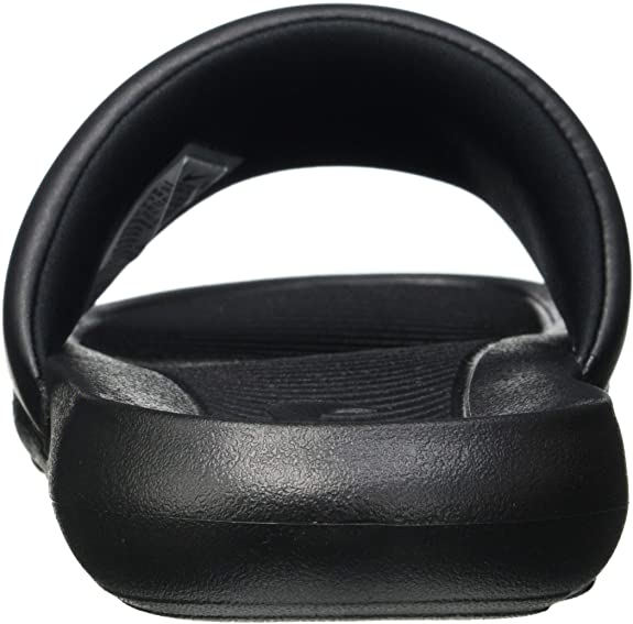Black Nike slide sandal showing contoured footbed and strap detail