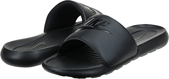 Pair of black Nike slide sandals with single wide strap