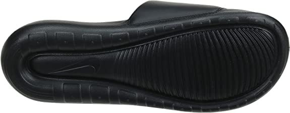 Black Nike slide sandal outsole with textured tread pattern