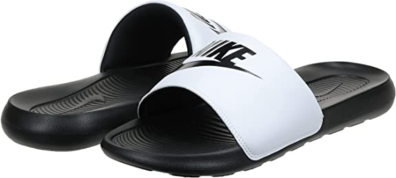 Black and white Nike Victori One slide sandal, open toe and curved footbed