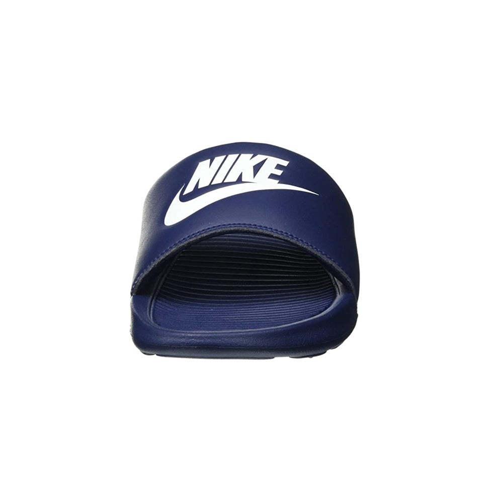 Navy slide sandal with white NIKE branding on the toe strap.