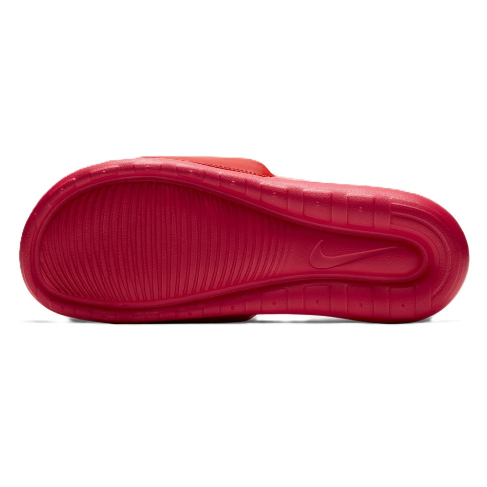 Men's red Nike slide sandal outsole, ridged rubber traction tread detail