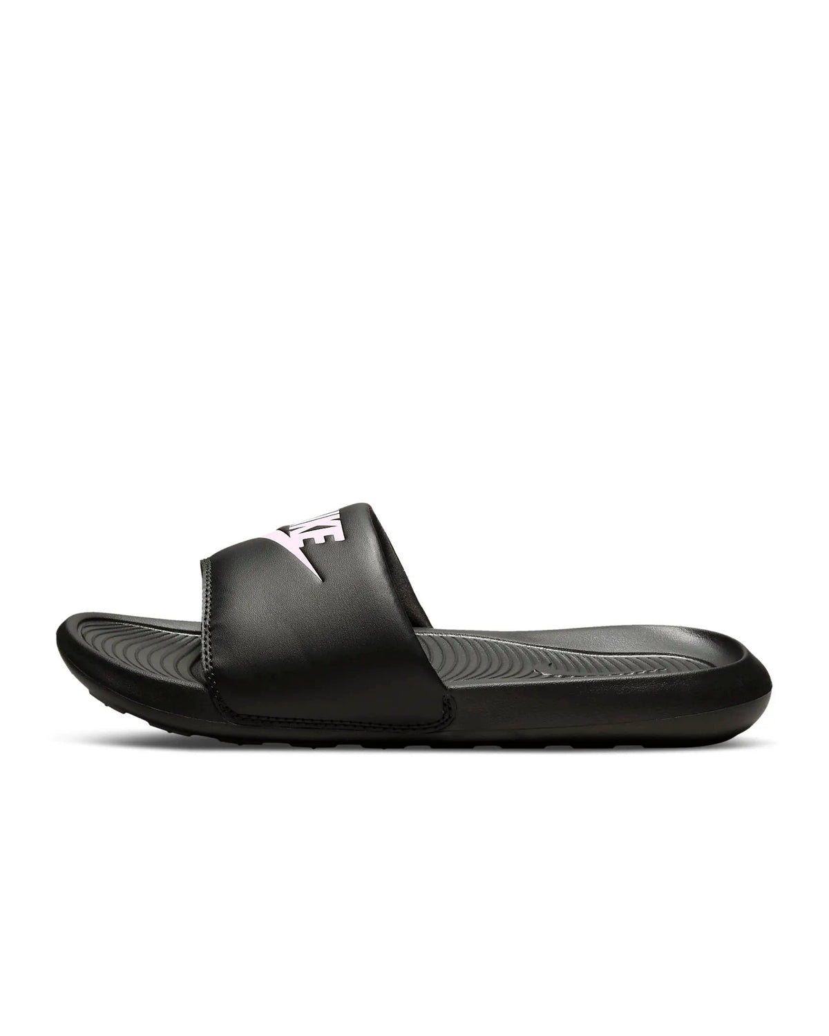 Women's black slide sandals with textured footbed and pink Nike logo accent
