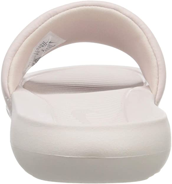 Women's Nike slide sandals, barely rose padded strap with Nike logo on footbed