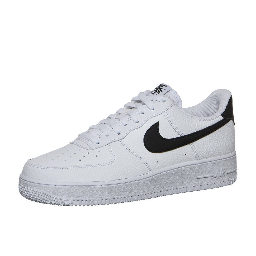 Men's low-top lace-up sneakers in white leather with black Swoosh
