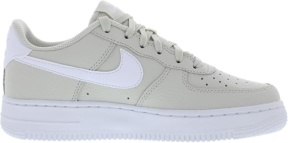 Big kids Nike Air Force 1 low-top sneaker in light bone with white Swoosh and laces