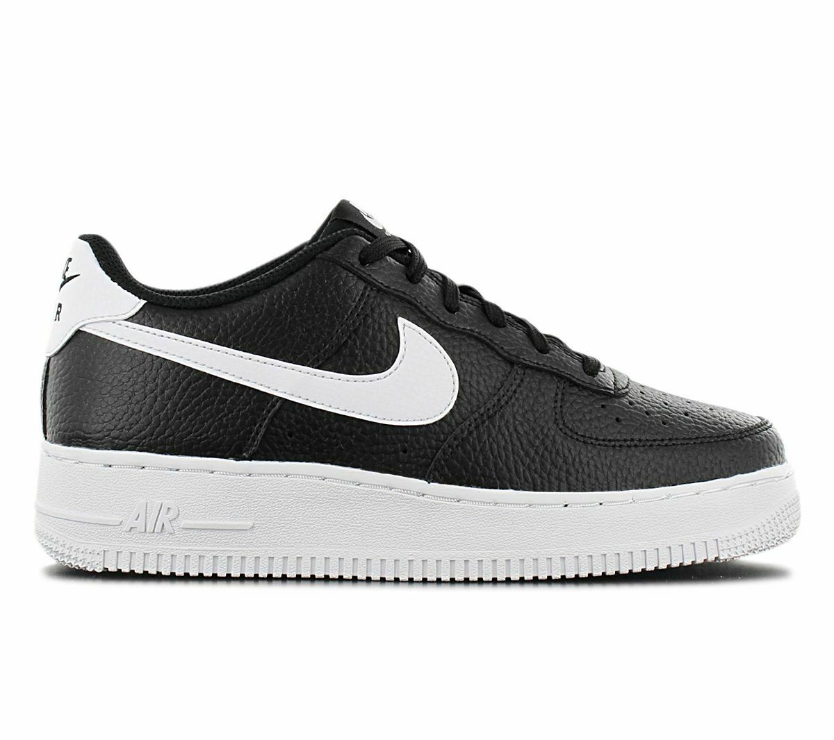 Black leather kids sneaker with white swoosh, lace-up, and white midsole