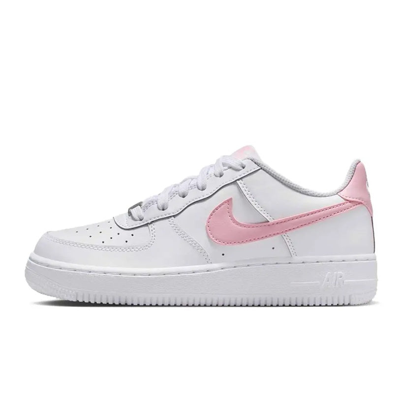 Kids' Nike Air Force 1 sneakers in white with pink swoosh and lace-up front