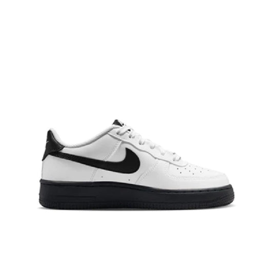 Kids' Nike Air Force 1 low-top sneakers, white leather with black swoosh and sole.