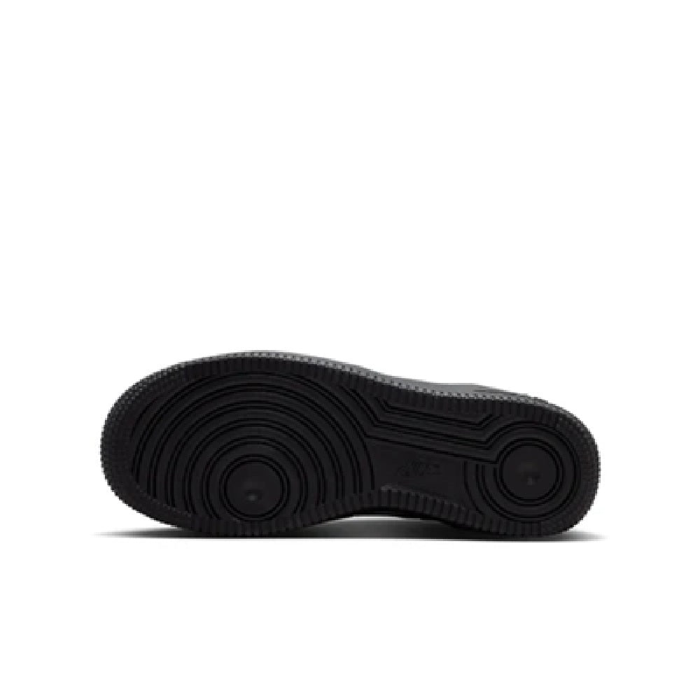 Kids' Nike Air Force 1 outsole, black rubber tread with circular traction details.