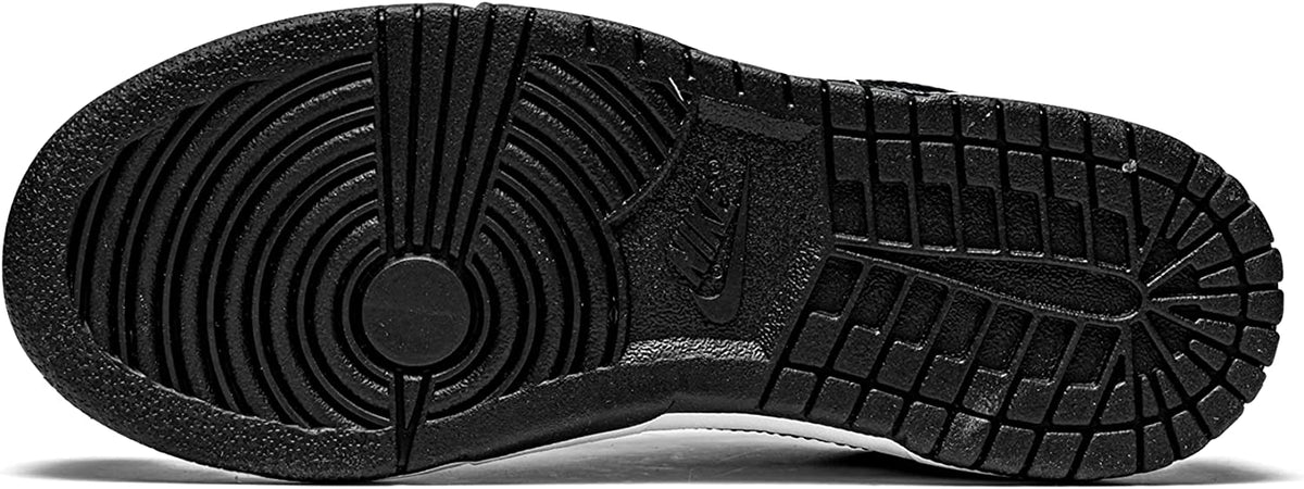 Toddler's Nike Dunk Low outsole, textured black rubber tread with white edge
